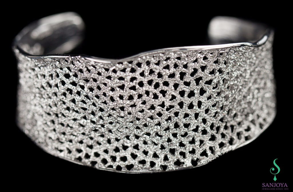 Verfijnde zilveren slavenarmband met schitteringen