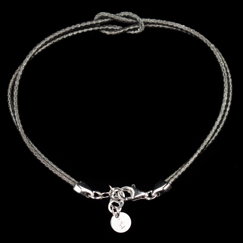 Verfijnd donkergrijs zilveren armbandje met knoop, 2mm
