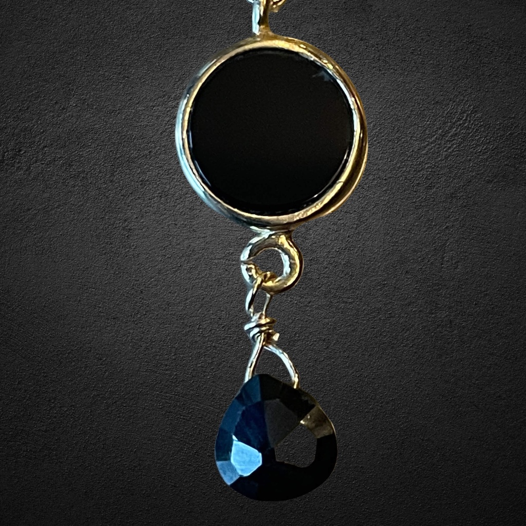 Vergulde schakelketting met 2 onyx steentjes