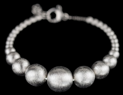 [ART0216009] Zilveren armband met kleine en grotere bollen
